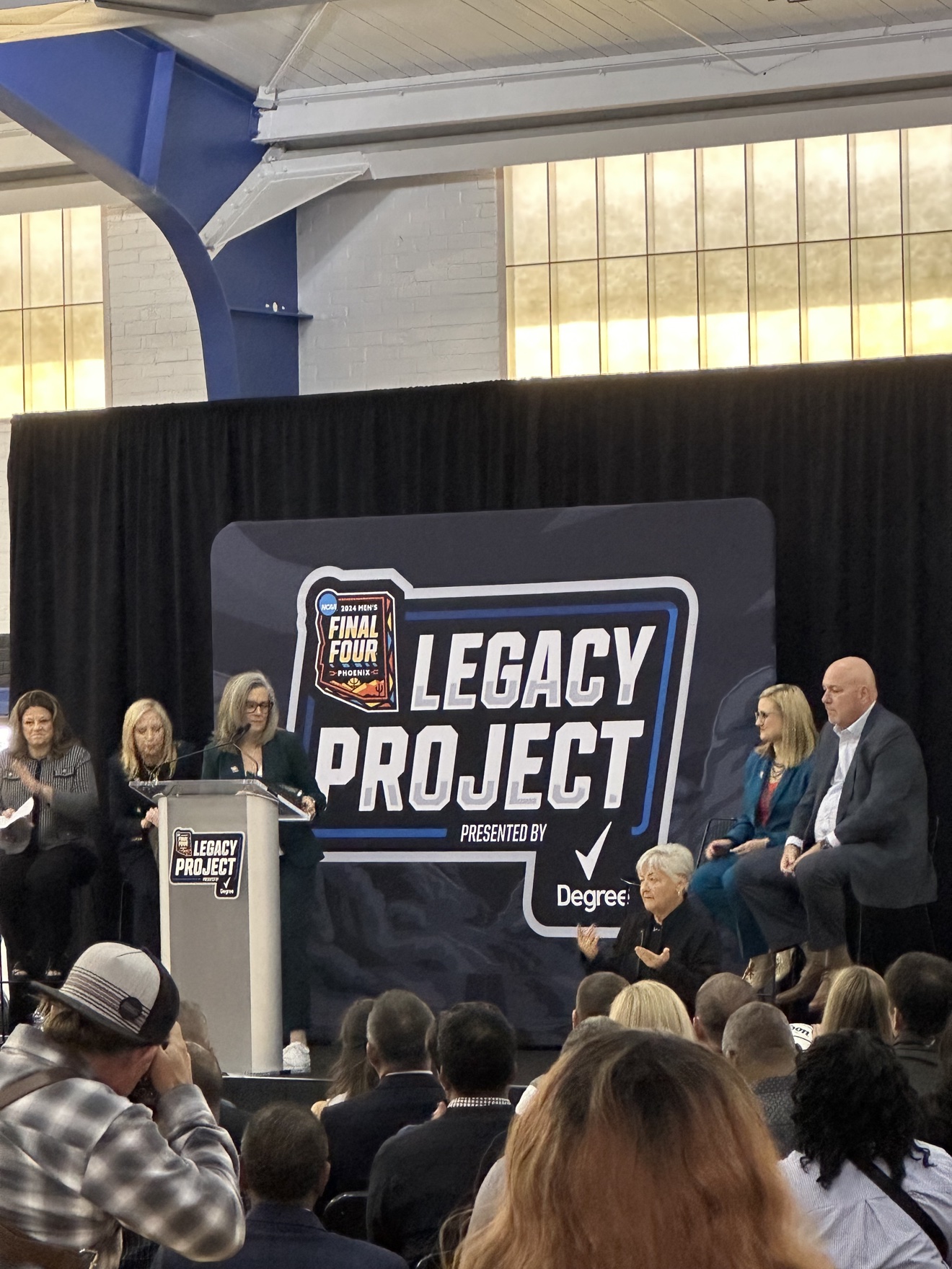 Final Four Legacy Project press event with branded staging and media setup
