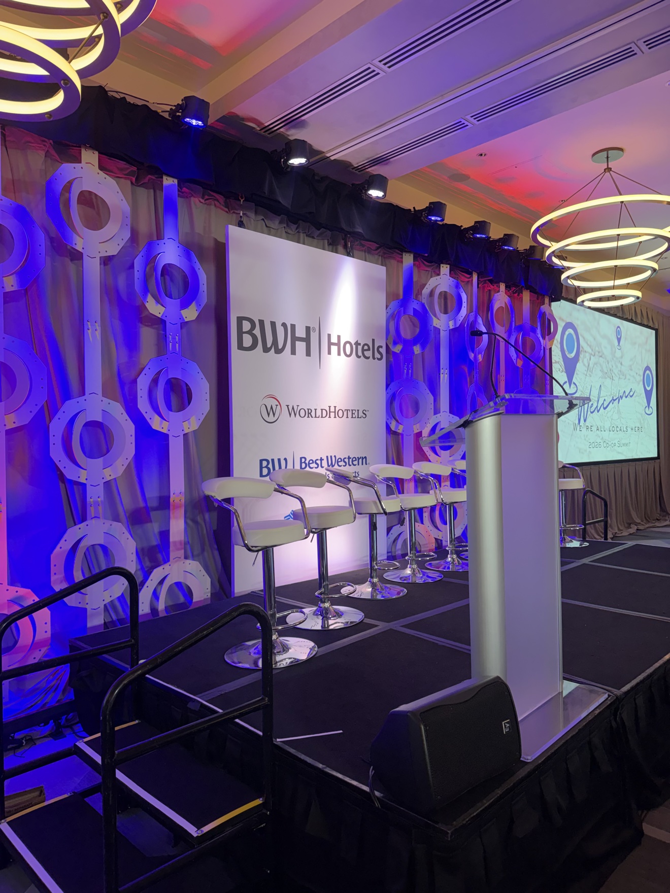BWH Hotels corporate event stage with presentation screens