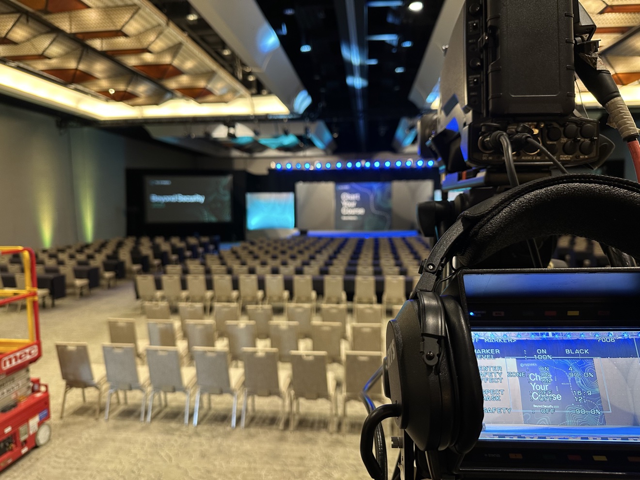 Broadcast camera overlooking a corporate general session